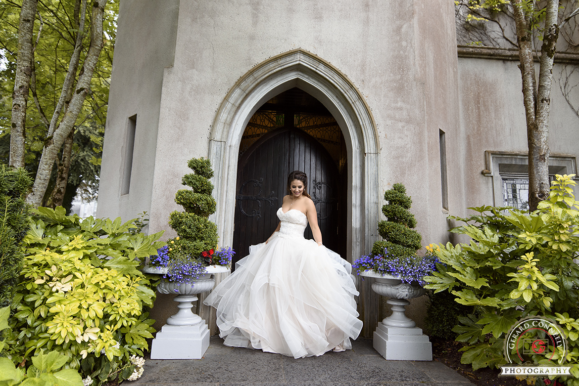 photography of bride dancing with her stunning dress at dromoland castle on her wedding day