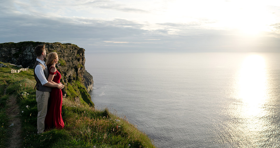 Sunset engagement photo at the cliffs of Moher