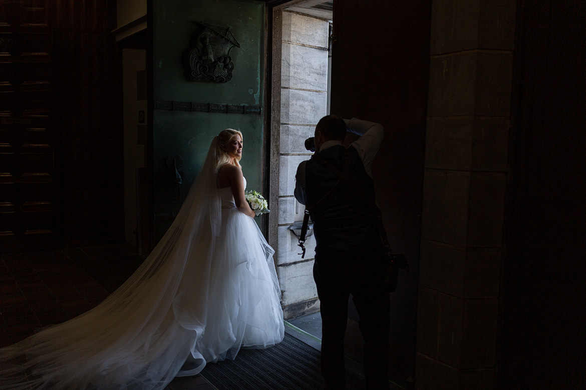 Behind the scenes photo of Gerard Conneely photographing a wedding at Galway Cathedral