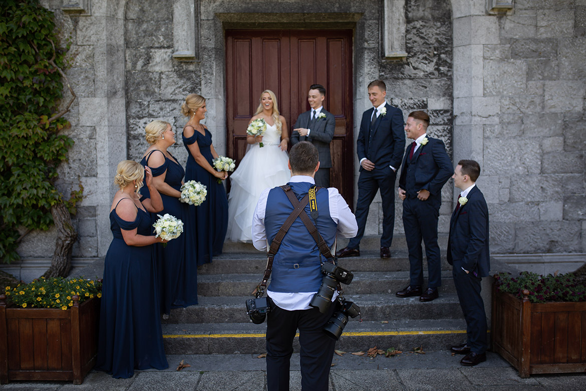Behind the scenes photo of Gerard Conneely photographing a wedding at NUIG