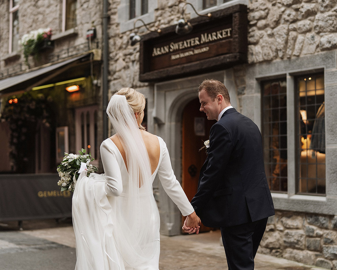 Real wedding day bride and groom on quay street Galway with Gerard Conneely Photography who like to take natural and relaxed wedding photos