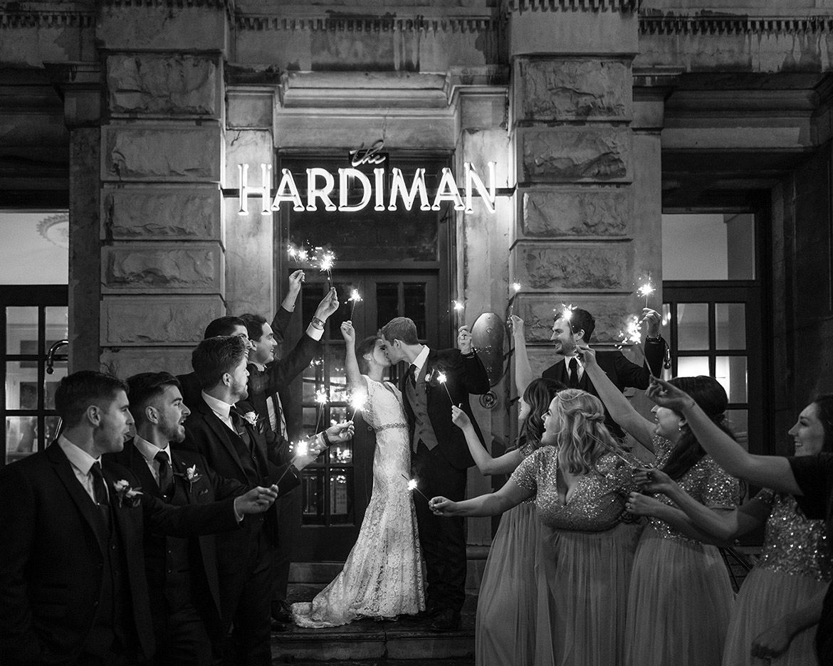 Wedding photography of bridal party with sparklers at the Hardiman hotel in Galway with Gerard Conneely